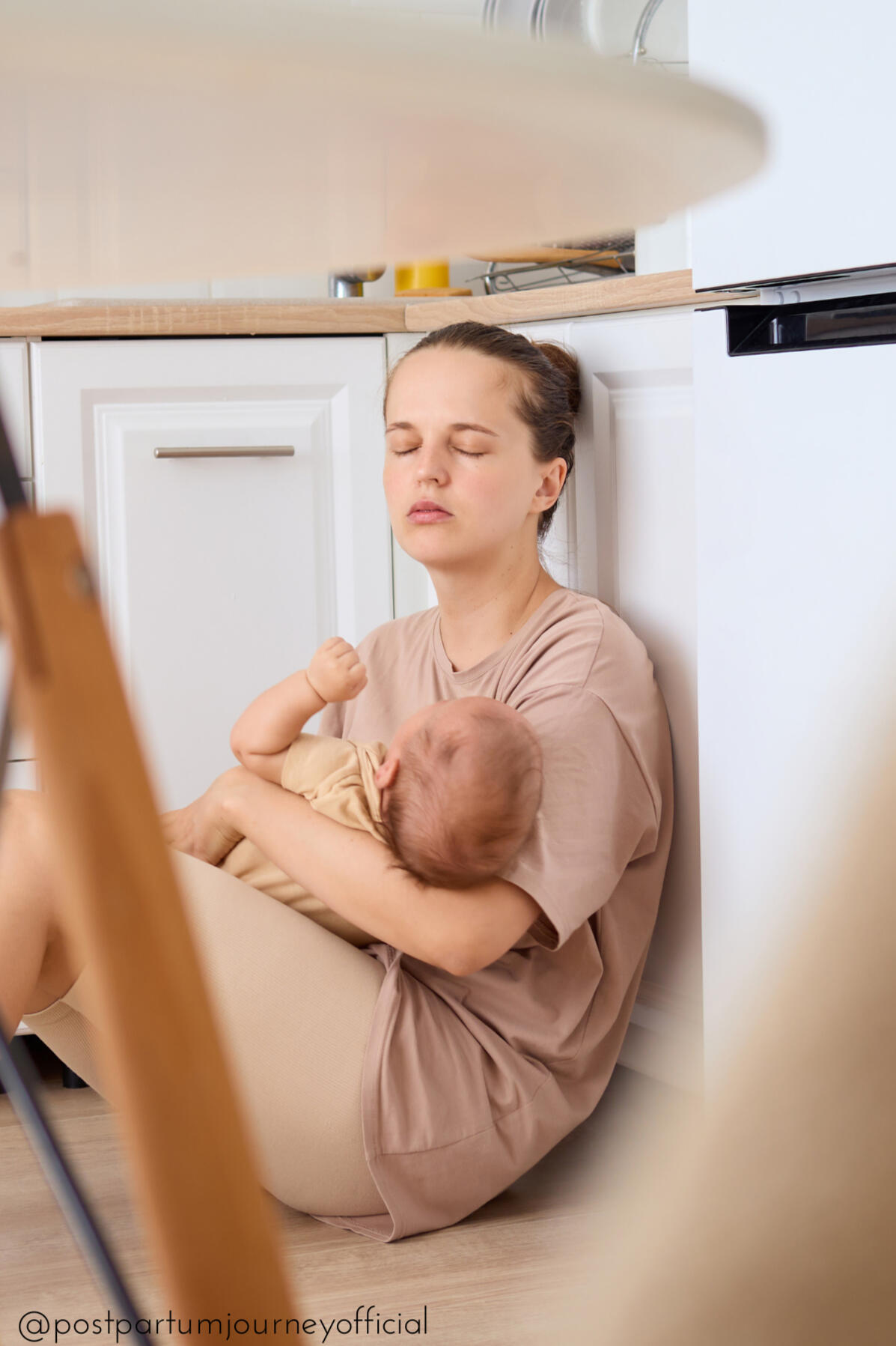new mom hiding/sleeping on kitchen floor with baby